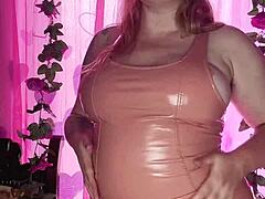 Titillating mom in latex outfit